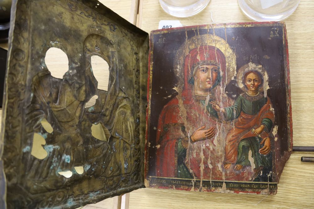 A 18th/19th century Russian painted wood icon with silvered brass oklad, Saint Theotohos Modegestria